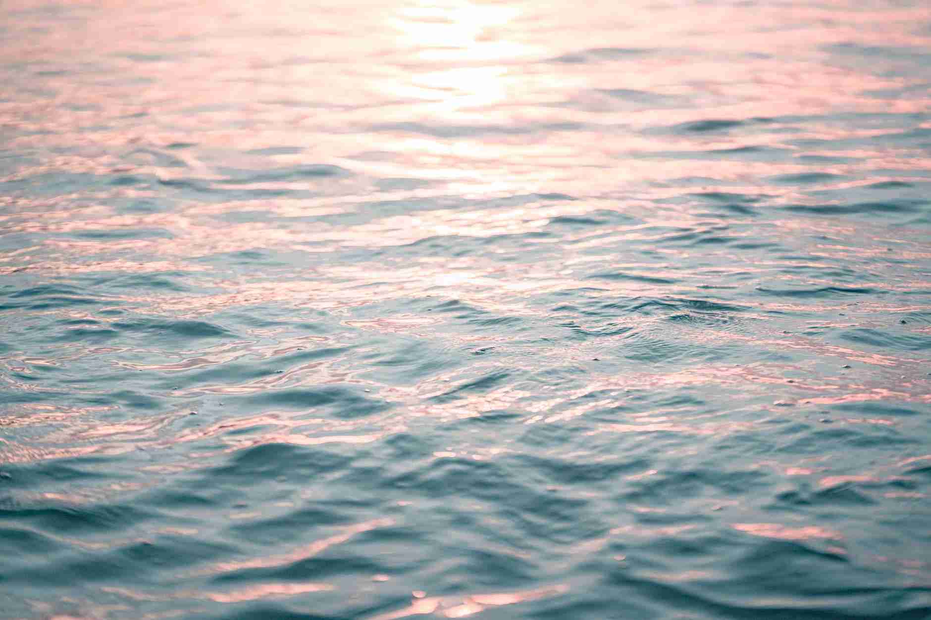 azure rippling seawater in sunset light